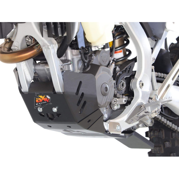 Left side of the black HDPE plastic skid plate with linkage guard for Triumph TF250-X and TF250-E