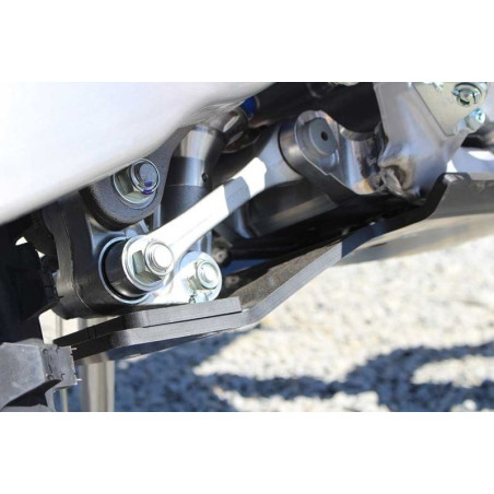 Close up view of the linkage guard of the black HDPE plastic skid plate for Yamaha WR250F - WR450F