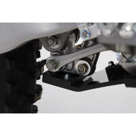 Close up view of the linkage guard of the black HDPE plastic skid plate for Yamaha YZ250F - YZ450F