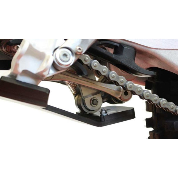 Close up view of the linkage guard of the black HDPE plastic skid plate for KTM - Husqvarna 125 / 150 2T