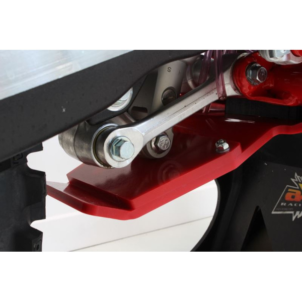 Close up view of the linkage guard of the red HDPE plastic skid plate for Beta 250RR - 300RR
