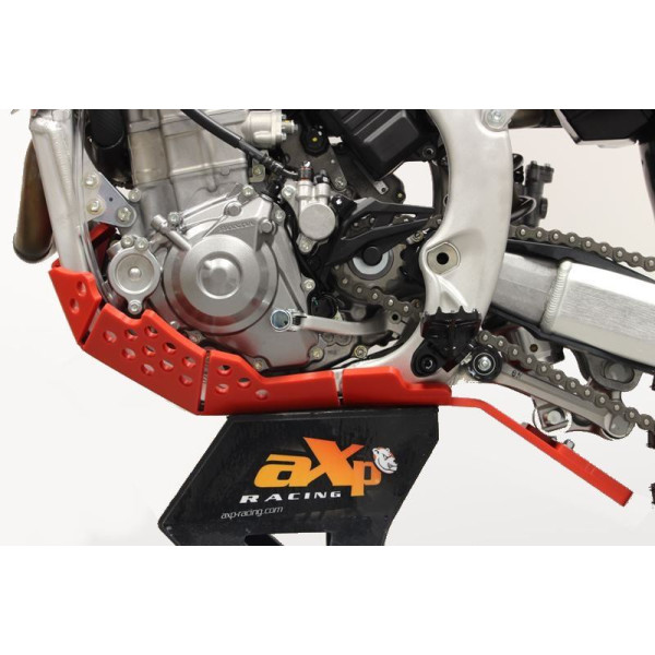 Left side of the red HDPE plastic skid plate with linkage guard for Honda CRF450R