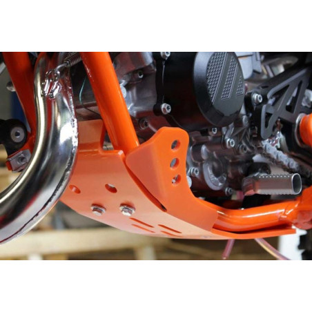 Left side of the orange HDPE plastic skid plate for KTM 85SX
